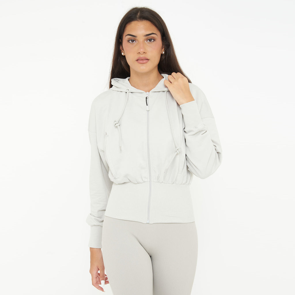 Giacca crop in cotone con zip e cappuccio Trixy